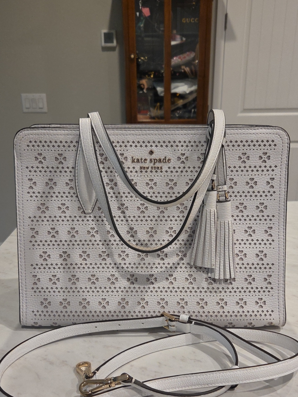 kate spade White Perforated Leather Tote with Tassel Detail